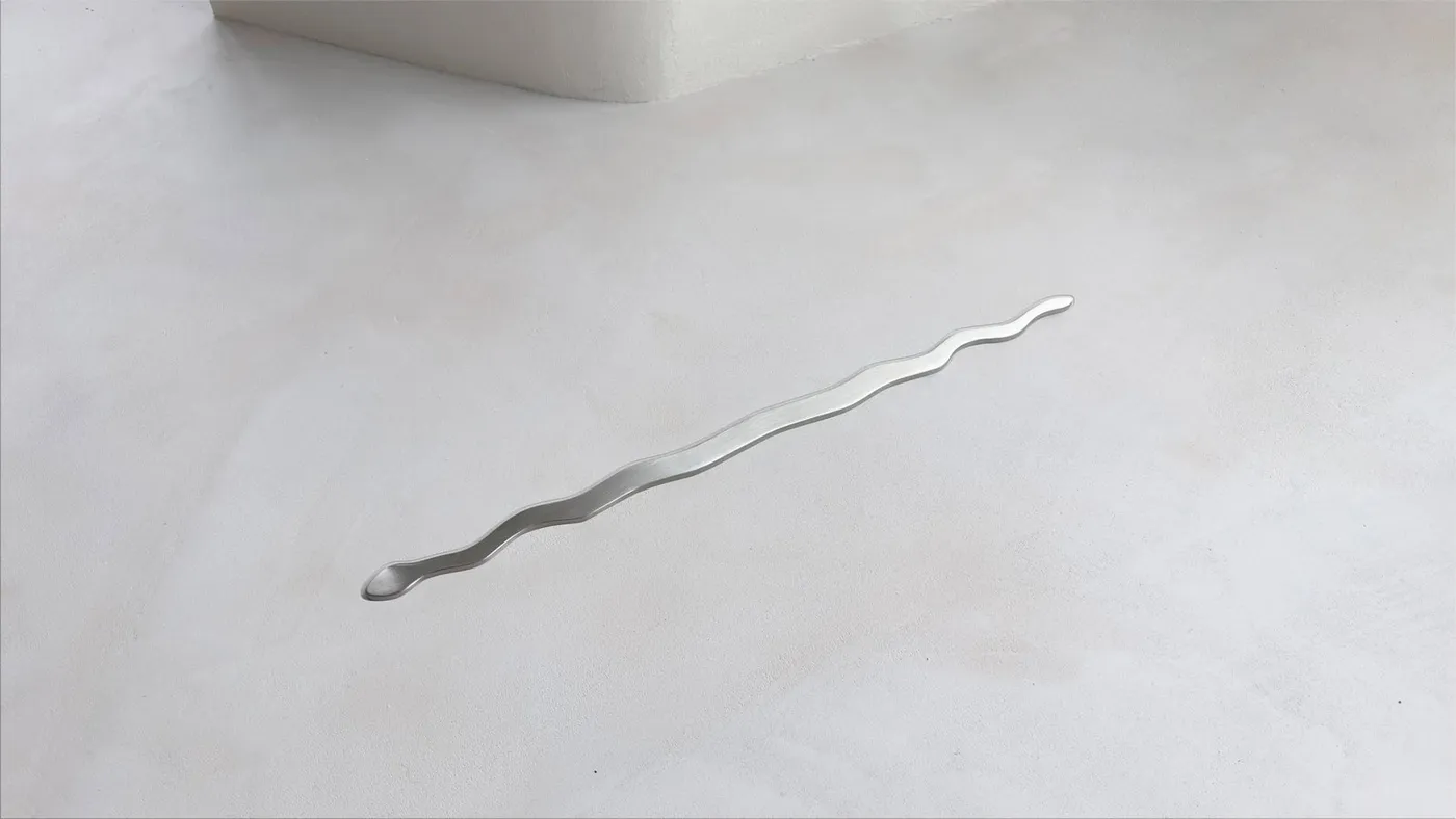 Carrodrain Liquid Snake — vlnitý designový žlab v mikrocementové podlaze